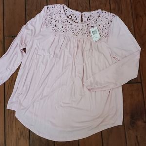 Sweet pink blouse with lace detailing on neckline